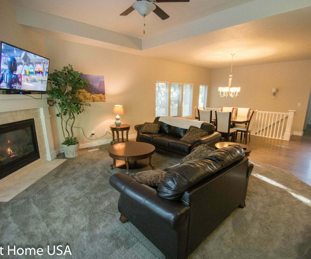 Additional living room photo of furnished 4 bedroom home in Cottonwood Heights, UT.